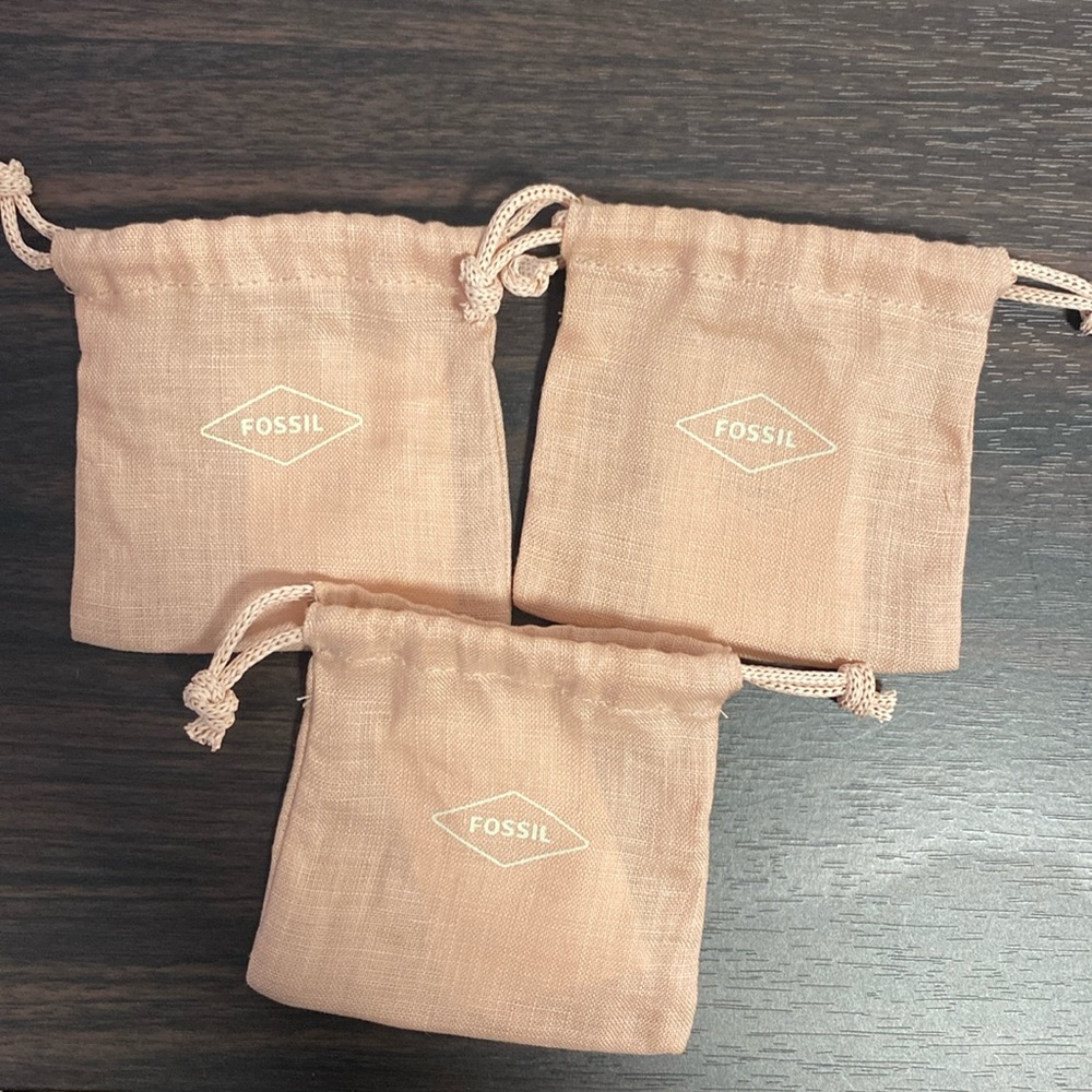 Brand New three (3) Fossil jewelry pull bags
